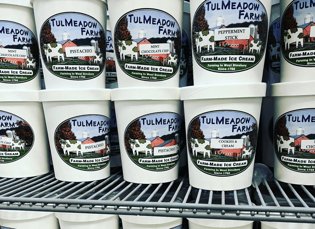 Tulmeadow Farms ice cream from West Simsbury, CT on display on a cooler rack.
