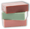 A stack of three bars of soap.